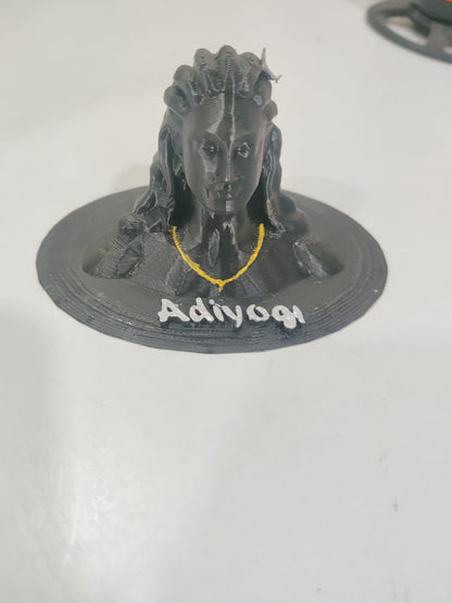 3D-printed figure with 'Adiyogi' text on a white background