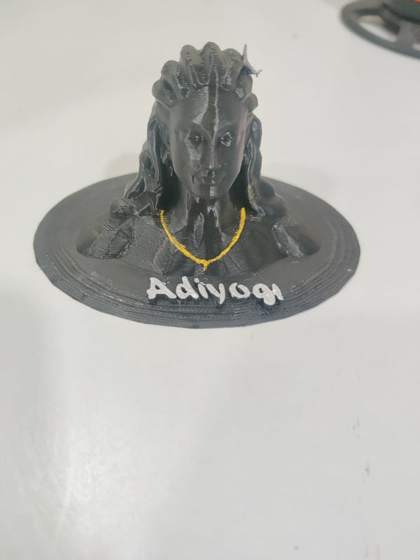 3D-printed figure with 'Adiyogi' text on a white background